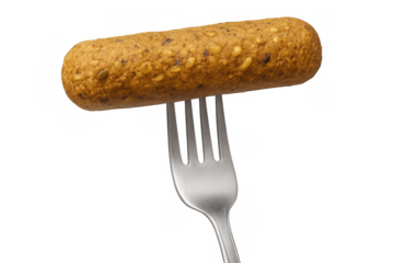 Plant-based veggie sausage being held on a fork, representing healthy eating, vegan lifestyle, and meat alternative options
