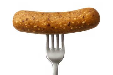 Plant based sausage on a fork representing vegan diet, healthy eating, and meat free alternative food