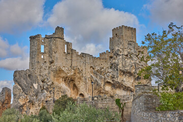Yznate castle ruins standing on rocky mountain in andalusia spain