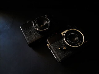 old photo camera on black