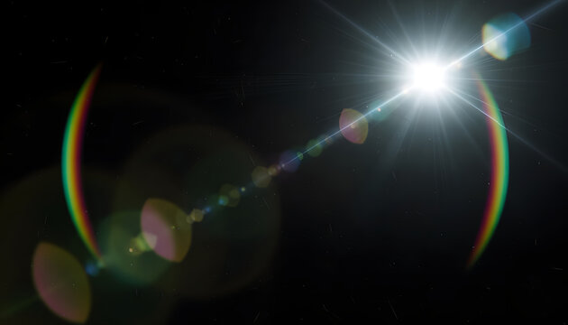 Bright lens flare effect with vivid spectral light on darkness