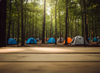 Summer camping in a dense green forest with many colorful tents
