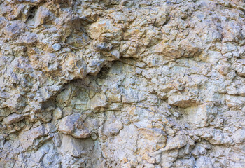 The structure of natural rock formations in a mountainous area is suitable for background screensavers and design works .