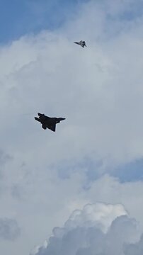 High-quality aerial video of F22 fighter jet landing at Pearl Harbor, Hawaii. Sharp military aircraft footage suitable for aviation, defense, and historical projects.