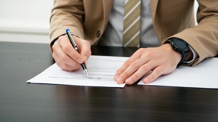 Close up of a businessman in formal suit signing an important contract or agreement at the office, emphasizing legal paperwork, professionalism, and official documentation process. - Powered by Adobe