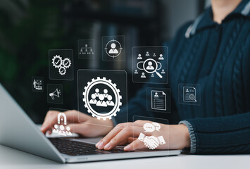 HR professional managing digital human resources system. Concept of HR software, recruitment, employee management, evaluation, candidate search and workforce solutions for modern organizations.