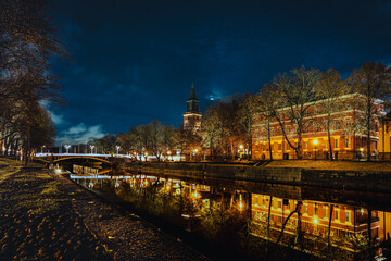 Night View of Aurajoki River with Turku Cathedral in Finland
