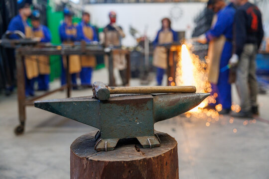 Anvil and hammer in artisan blacksmith workshop - Powered by Adobe