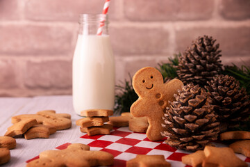Christmas Cokkies. Homemade smiling gingerbread man cookie, traditionally made at Christmas time and the holidays.