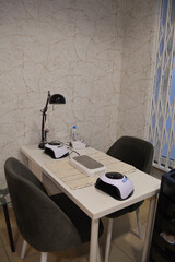 Room for manicure with two working places in the beauty salon. nail salon room. The concept of nail aesthetics and self-care