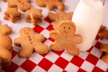 Christmas Cokkies. Homemade smiling gingerbread man cookie, traditionally made at Christmas time and the holidays.