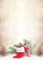 Christmas background with decorative Santa's red boot and gift bag, branch and pine cones for tree decoraton. New Year winter holidays fantasy card with decor and copy space, festive postcard.