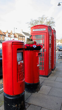 Red post box and telephone box in the market town of Yarm