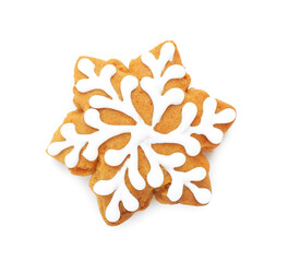 Tasty gingerbread cookie in shape of snowflake isolated on white, top view. Christmas treat