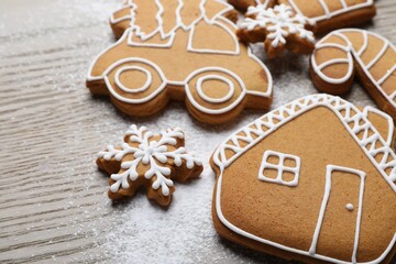 Christmas treat. Tasty gingerbread cookies on wooden table, closeup. Space for text