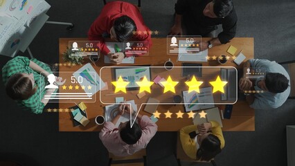This image captures a team engaged in a strategic meeting, discussing positive customer feedback and high ratings to enhance business solutions and innovative strategies. Raster