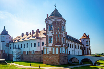 Mir Castle, a UNESCO World Heritage site in Belarus, is depicted on a sunny day with its...