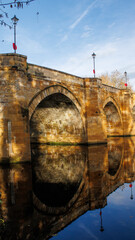 The road bridge over the river tees at Yarm with reflections onto the river