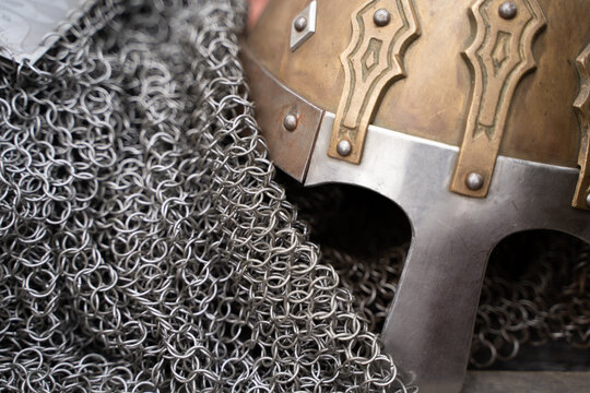 an ancient helmet for reconstruction and a chain mail