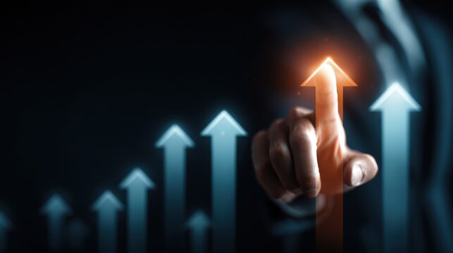 Businessman pointing at upward arrow, business growth and success concept