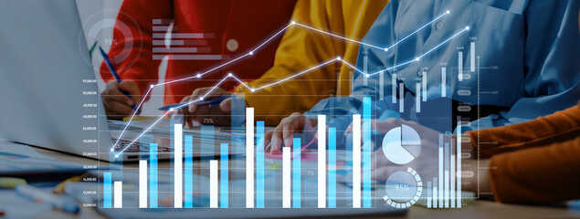A business team engages in collaborative analysis with colorful graphs and data visualization in a modern office setup, driving strategic decisions and insights. Scalp