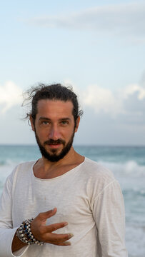 portrait of a vman smiling on the beach