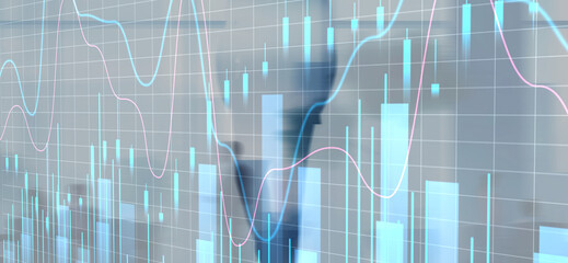 Financial graphs and charts on blurred modern city background. Investment and trading concept