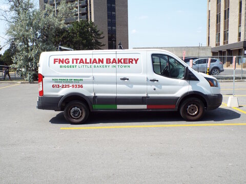 Ottawa, ON, Canada-June 25,2025:A white commercial delivery van belonging to "FNG ITALIAN BAKERY," on Prince of Wales.
