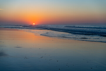 Obraz premium Hazy Morning Beach Sunrise