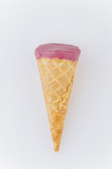 Berry pink ice cream cone isolated on white background, trendy minimal dessert concept