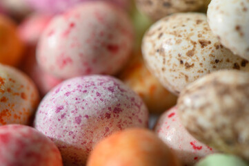Georgian Peanuts in Milk Chocolate and Colored Glaze on Wooden Tray