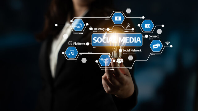 A businesswoman holds a light bulb while various social media icons surround her, symbolizing innovation in digital communication and the power of connection. Tessel - Powered by Adobe