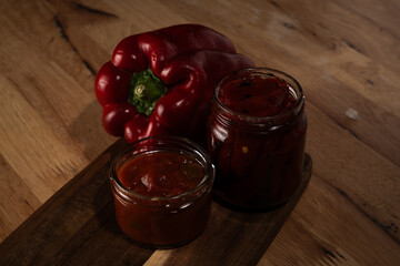 Homemade red pepper jam and sauce canning