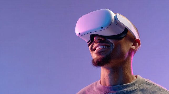 Contented young man wearing a virtual reality headset against a purple background experiences immersive digital content