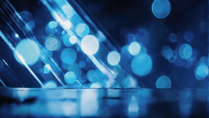 Abstract Blue Bokeh Lights and Reflections on a Surface.