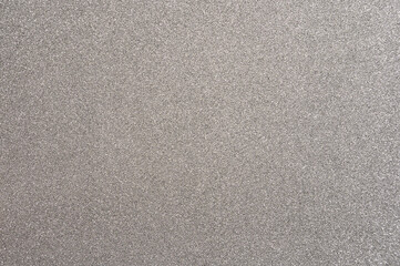Shimmering silver surface with a smooth texture used for creative projects and design work