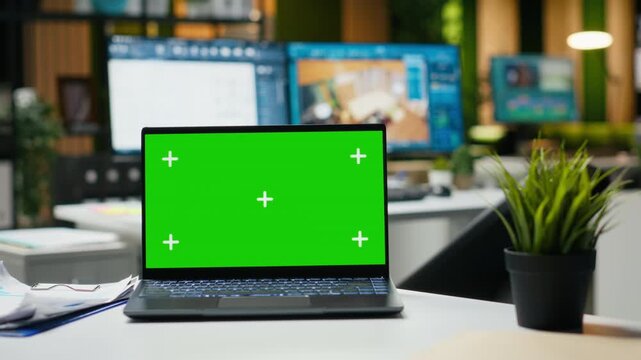 Chroma key laptop for interior design studio and modern technology, dual monitors with architectural software for modeling and visualization. Floor plans and 3D render reflecting creativity.