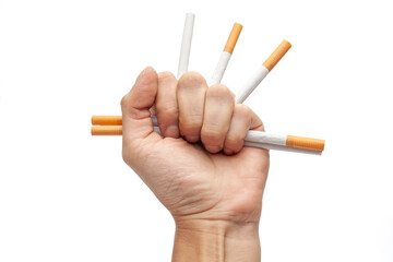Hand crushing cigarettes, stopping addiction, quitting smoking habit