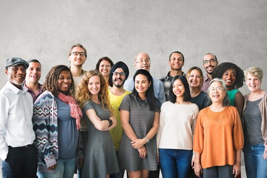 A team of diverse people doing a group photo
