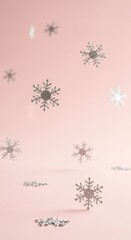 Silver glittering snowflake decorations falling on a pink background for Christmas and New Year concept, winter holiday celebration.