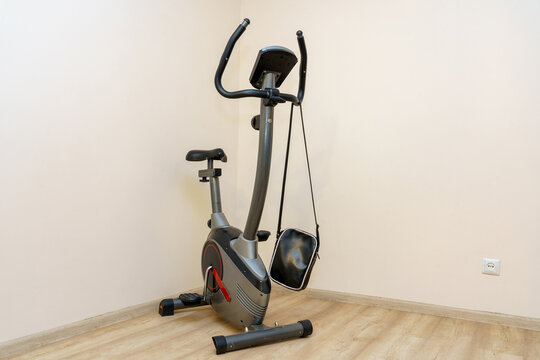 Elliptical machine placed in a minimalistic indoor space for exercise and fitness