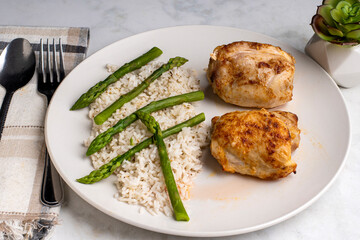 chicken thighs  with  asparagus and rice