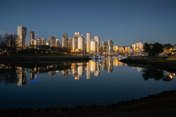 Naklejka premium False Creek Twilight Yaletown Skyline. A False Creek twilight reflections in Vancouver. British Columbia, Canada. 
