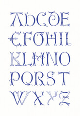 Hand-drawn alphabet created with ink and pen. Ornamental blue lettering in artistic calligraphic style on white background.