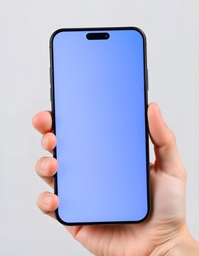 Hand holding modern smartphone with empty screen. Mobile phone mockup for app developers and designers. Ideal for showcasing digital products and mobile applications.
