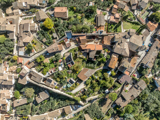 Fototapeta premium Aerial top down ground plan view of Eggi walled medieval hilltop town in Italy