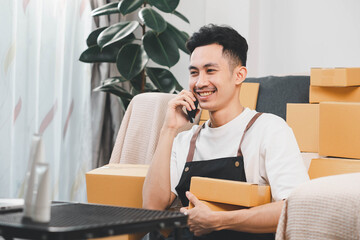 Startup small business owner packing boxes for online customer delivery. Entrepreneur managing e-commerce orders, shipping parcels, and running home-based business operations from home office.