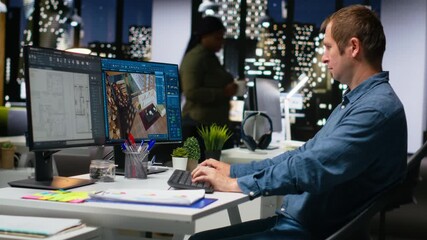 Portrait of engineer working on floor plan interior design at computer, using architectural software and blueprints for 3D render of home interior. Configure furniture and elements. Camera B.