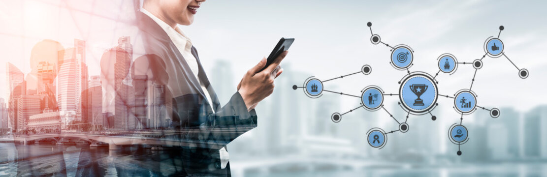 A business professional engages with a smartphone while surrounded by digital network connections, showcasing icons of achievements and a modern urban backdrop. Tessel - Powered by Adobe
