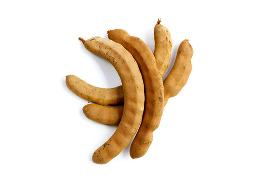 Fresh tamarind on a white background.